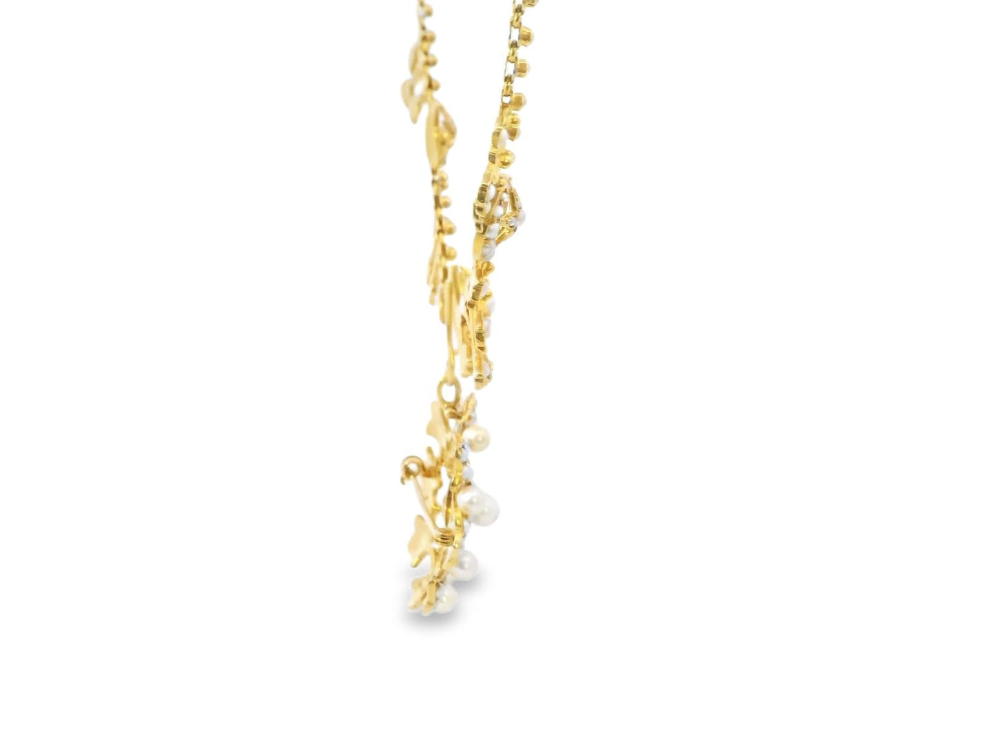 A Victorian 14kt gold and pearl fringe necklace, designed with crescent and star