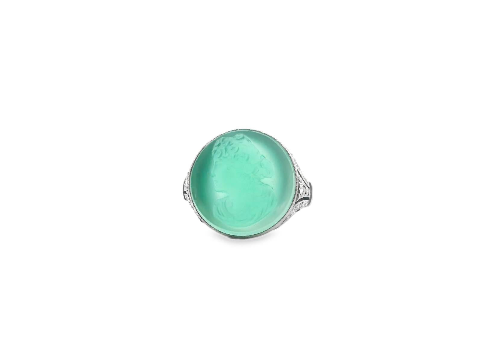 An Art Deco American Platinum Diamond and Chrysoprase Cameo Ring