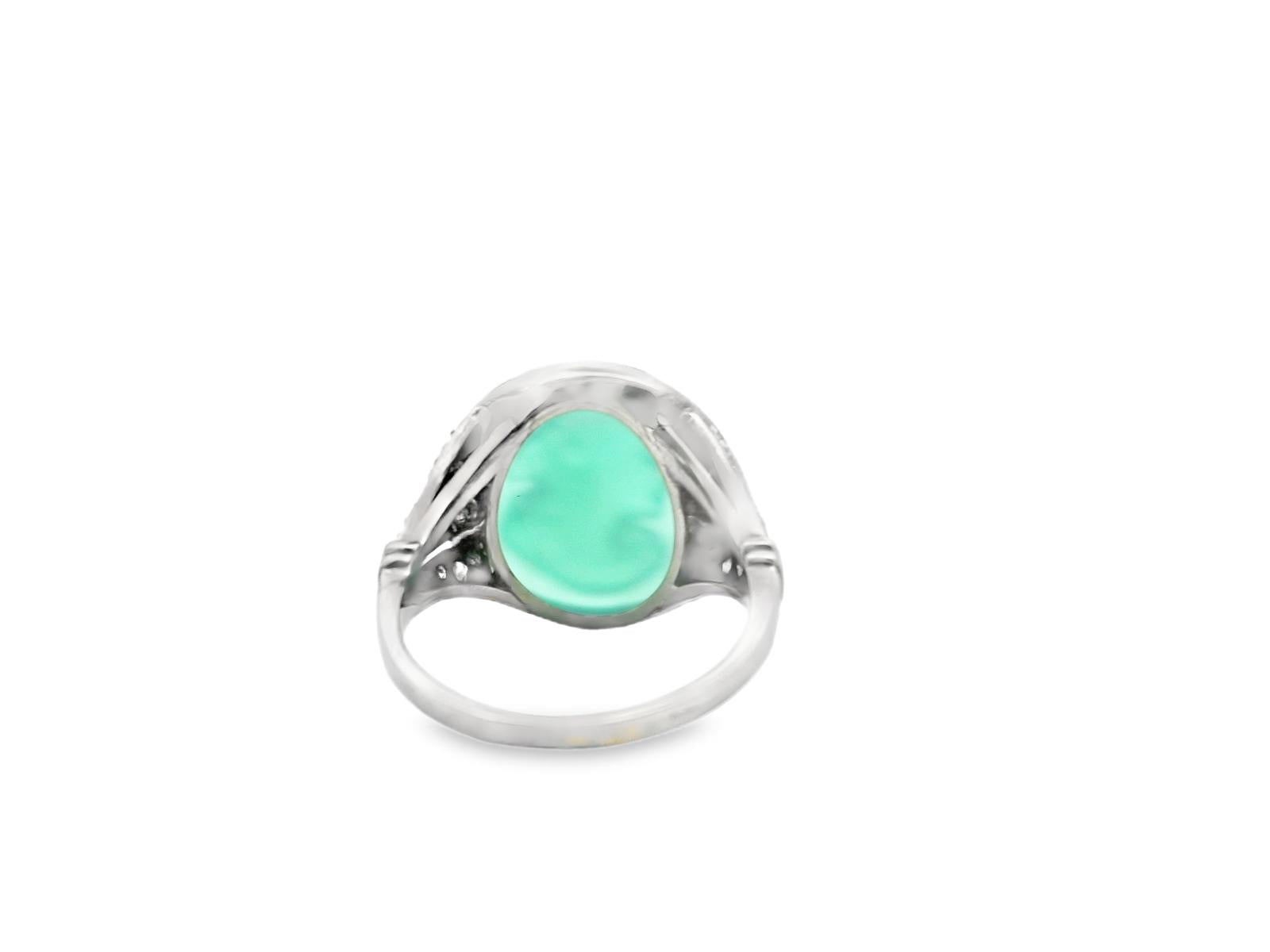 An Art Deco American Platinum Diamond and Chrysoprase Cameo Ring