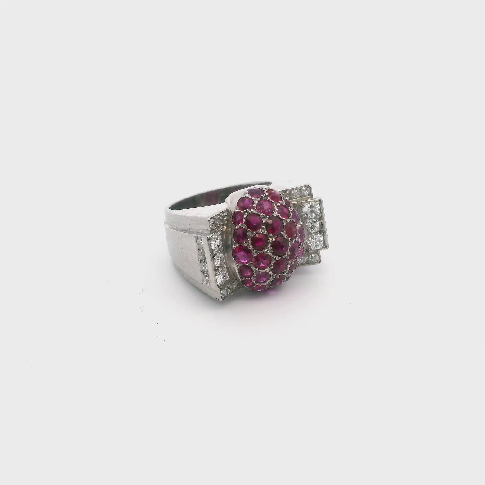 A 950 platinum Tank ring set with round brilliant cut rubies and 8x8 cut Diamond